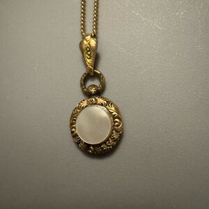 Antique mother of pearl small locket in gold filled